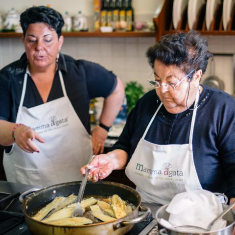 Mamma Agata making eggplant parmesan in her kitchen in ravello, italy, the taste edit