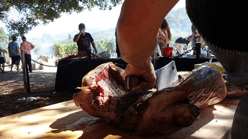 Heritage Fire cutting pork