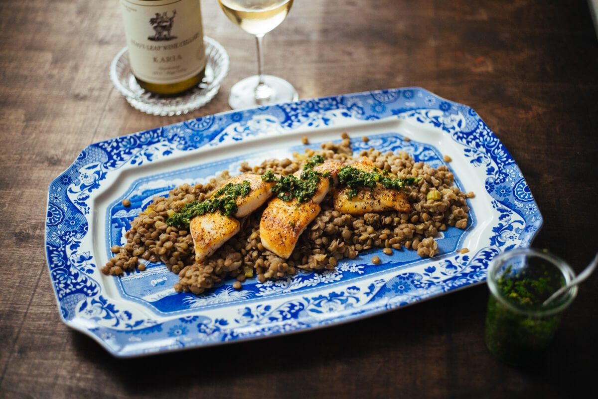 Serving Pan Seared Halibut with Lentils and Salsa Verde recipe by The Taste Edit