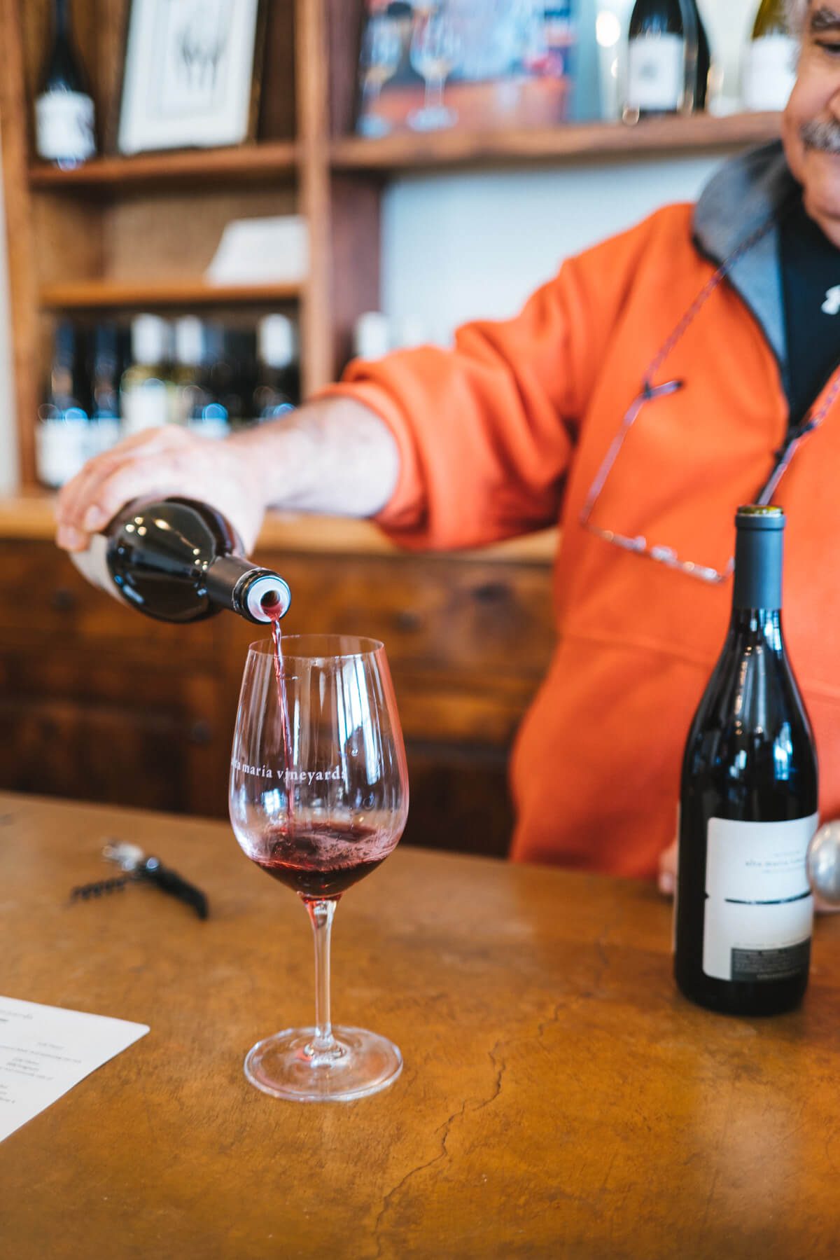 Jim pours The Taste Edit Alta Maria Vineyard wine.