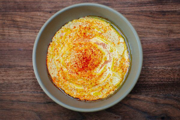 Garlic Hummus made with dried chickpeas in a food processor