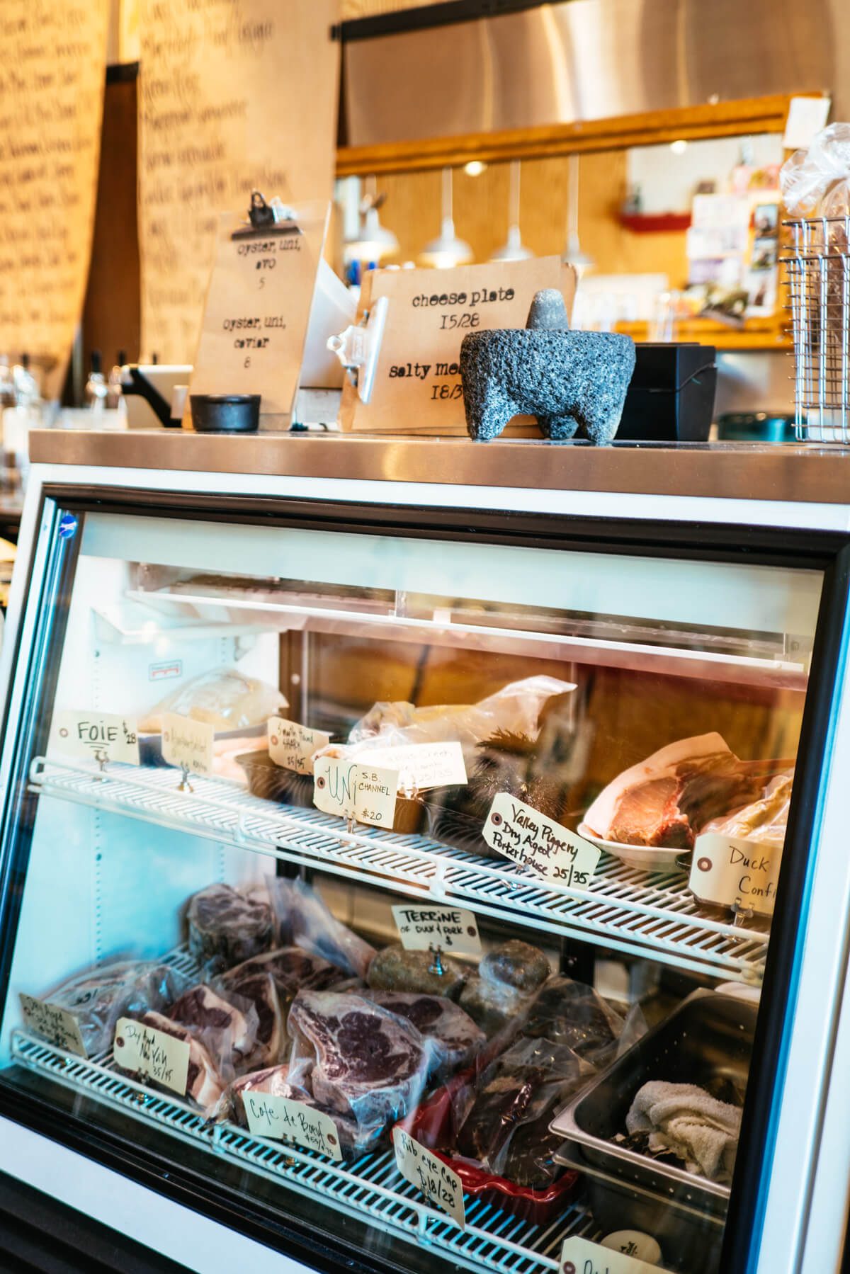 Industrial Eats case of meats to take away