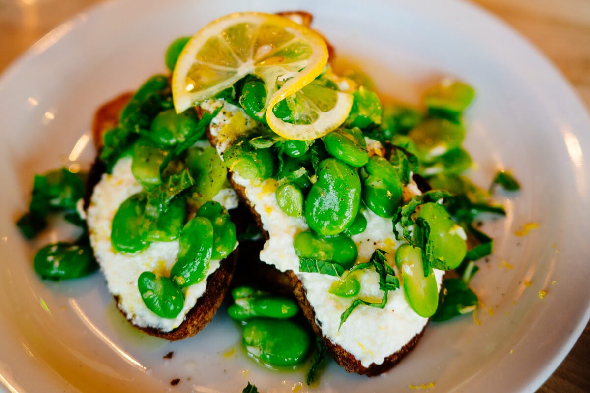 Fava beans and ricotta on toast at Industrial Eats