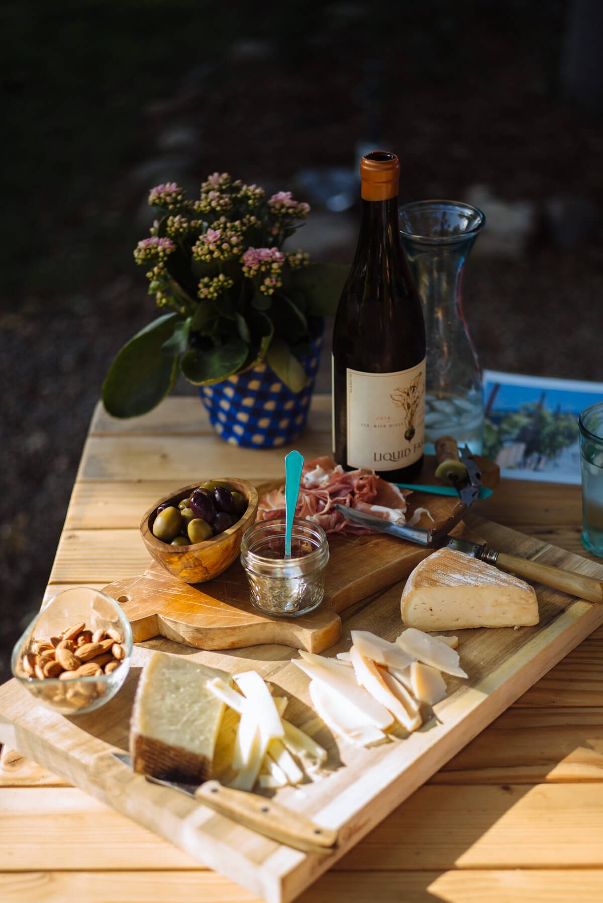 Liquid Farm's Golden Slope wine with charcuterie board - The Taste Edit tasting outside in Santa Ynez Valley