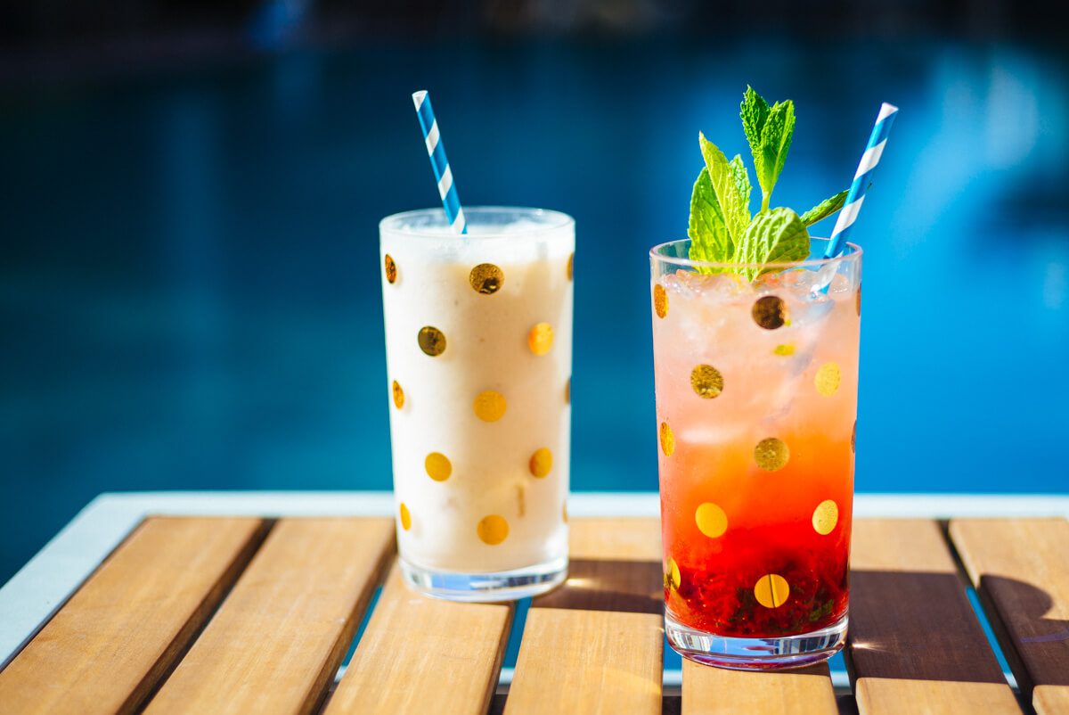 The Taste Edit serves Strawberry mojito and pina colada summer cocktails in kate spade polka dot glasses by the pool.