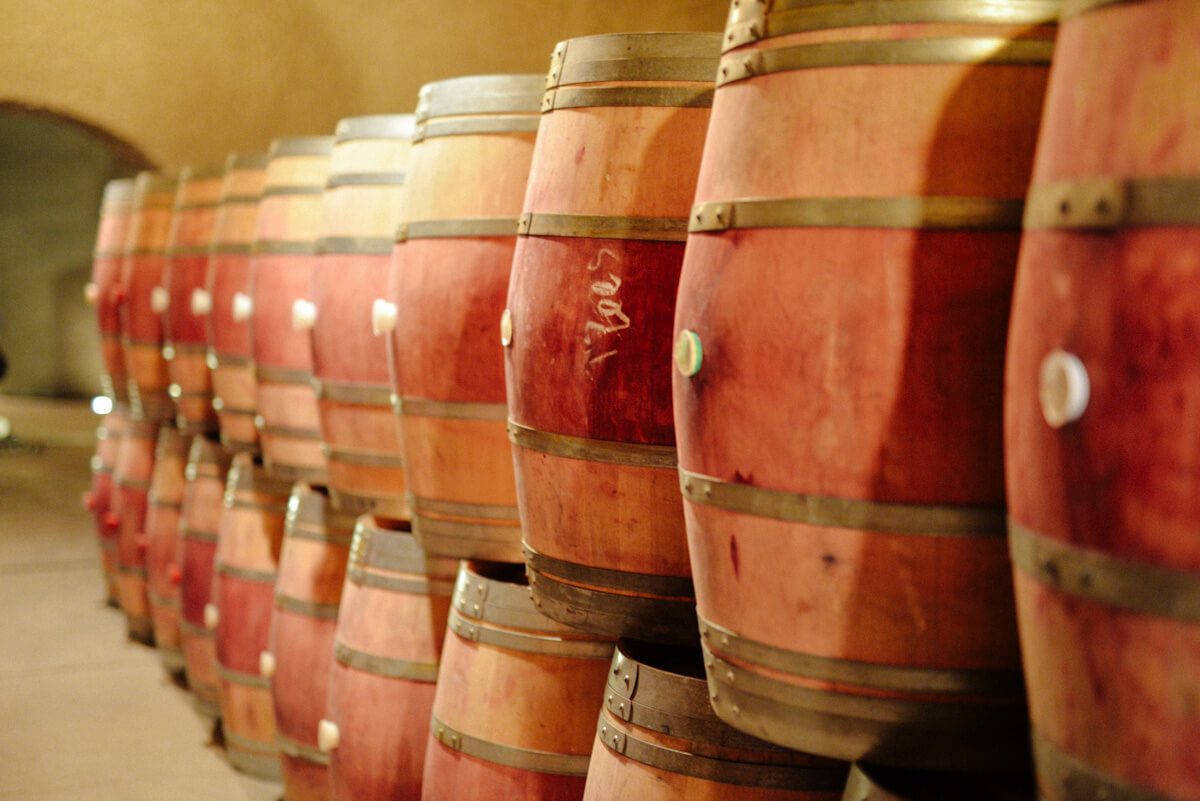 French oak wine barrels in Quintessa winery's beautiful caves