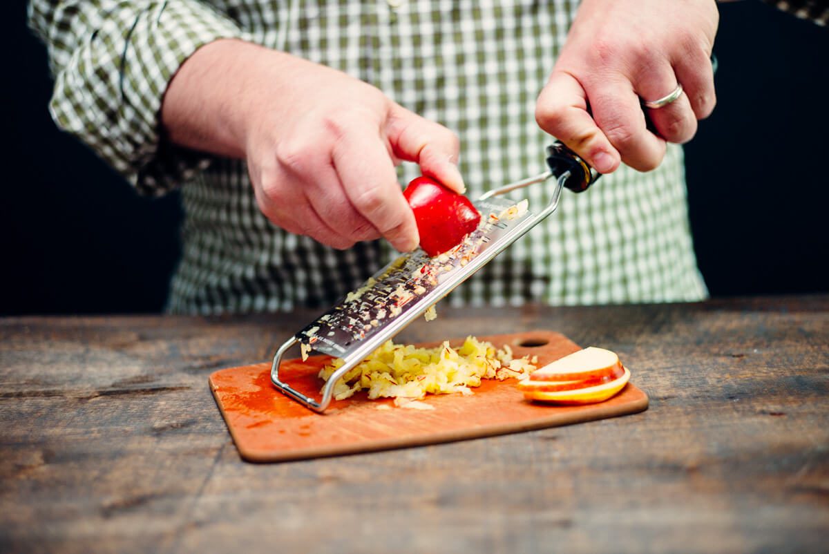 Grating apples makes it easy to muddle for a Conquistador's Tonic cocktail