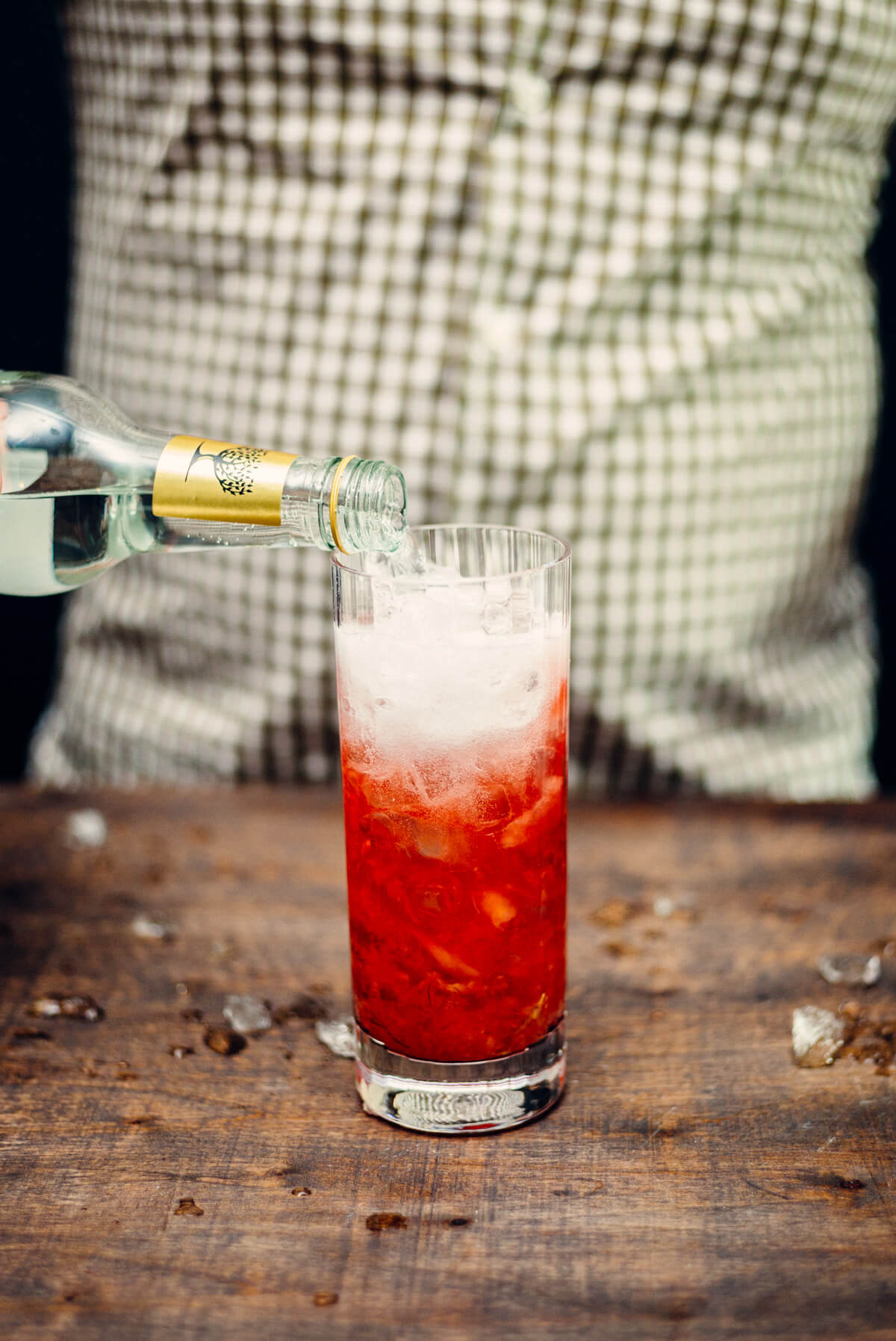 Adding fever-tree tonic water to make a Conquistador's Tonic cocktail