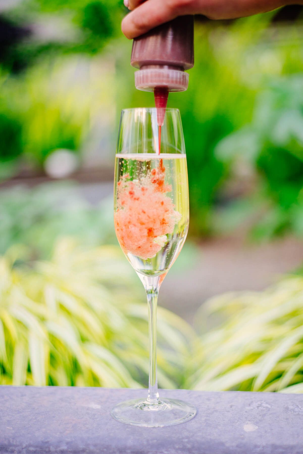 The Taste Edit uses plastic squeeze bottles when making cocktails like this pluot bellini.