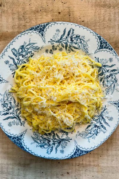 The best lemon pasta recipe inspired by the Amalfi Coast in Italy using lemon, egg pasta, cream, and topped with cheese. An easy weeknight lunch paired with a salad.