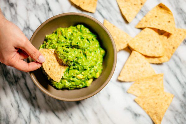 The Taste Edit serves their fresh guacamole with corn chips