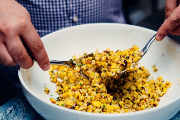A grilled corn salad is a simple side dish to bring to any summer party or picnic.