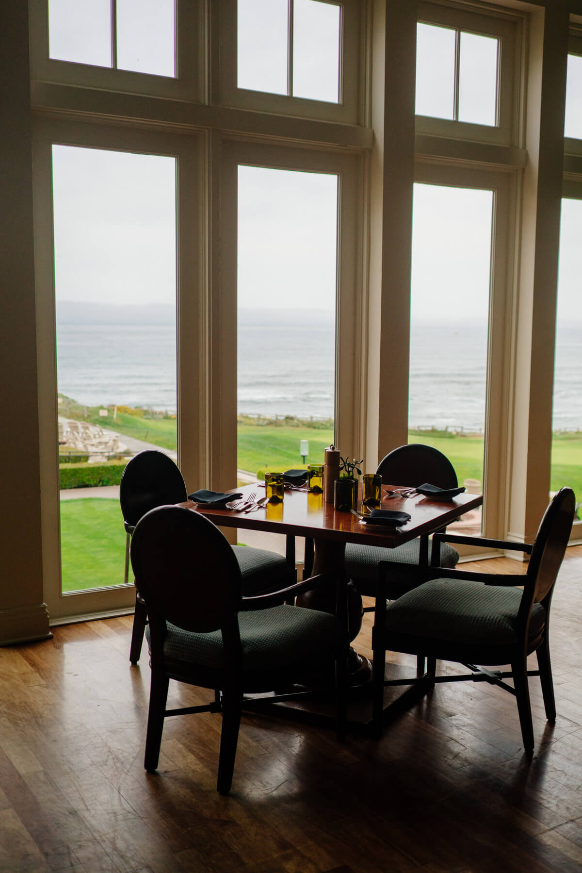 Large windows look over the ocean at The Ritz-Carlton Half Moon Bay