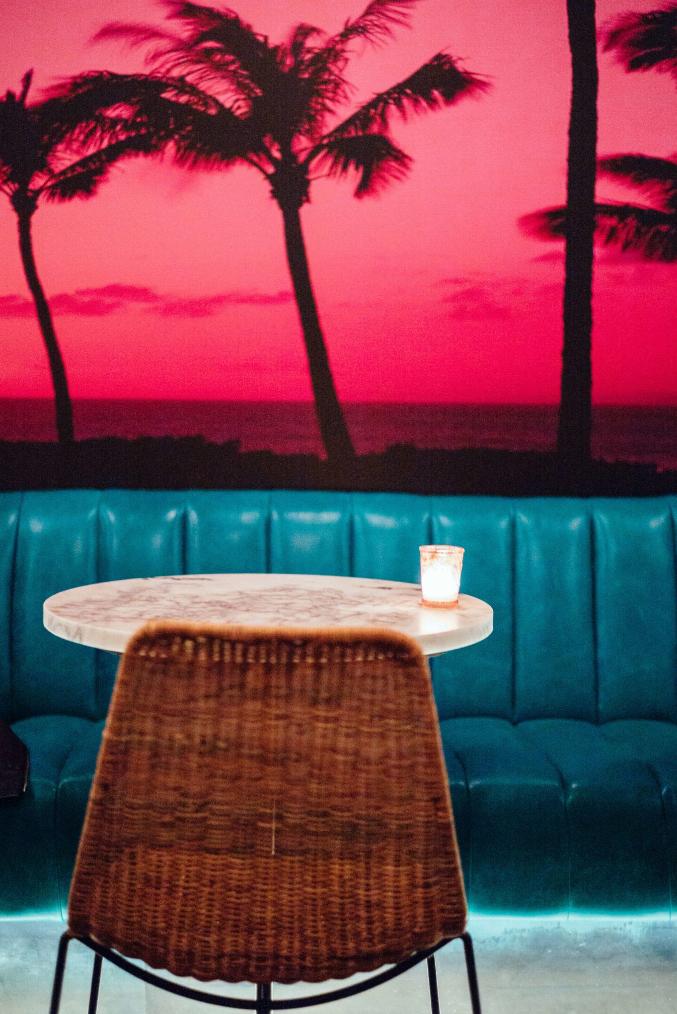 Louie's Gen Gen Room in San Francisco seating area palm tree wallpaper The Taste Edit