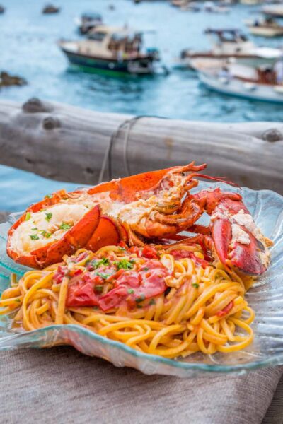 Best lobster pasta recipe from Italy in the Amalfi Coast at Lo Scoglio Delle sirens beach club in Capri at the beach