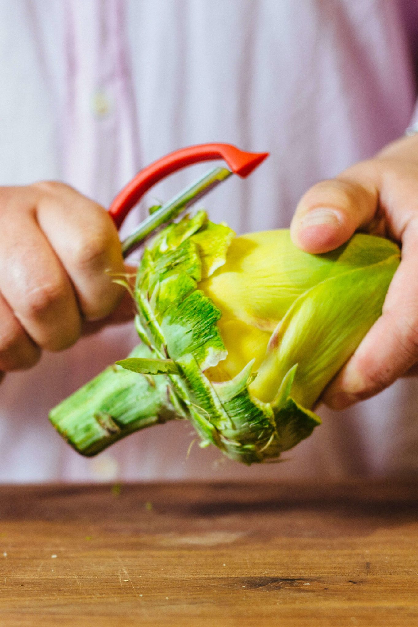 how to trim an artichoke - use the peeler to clean the edges