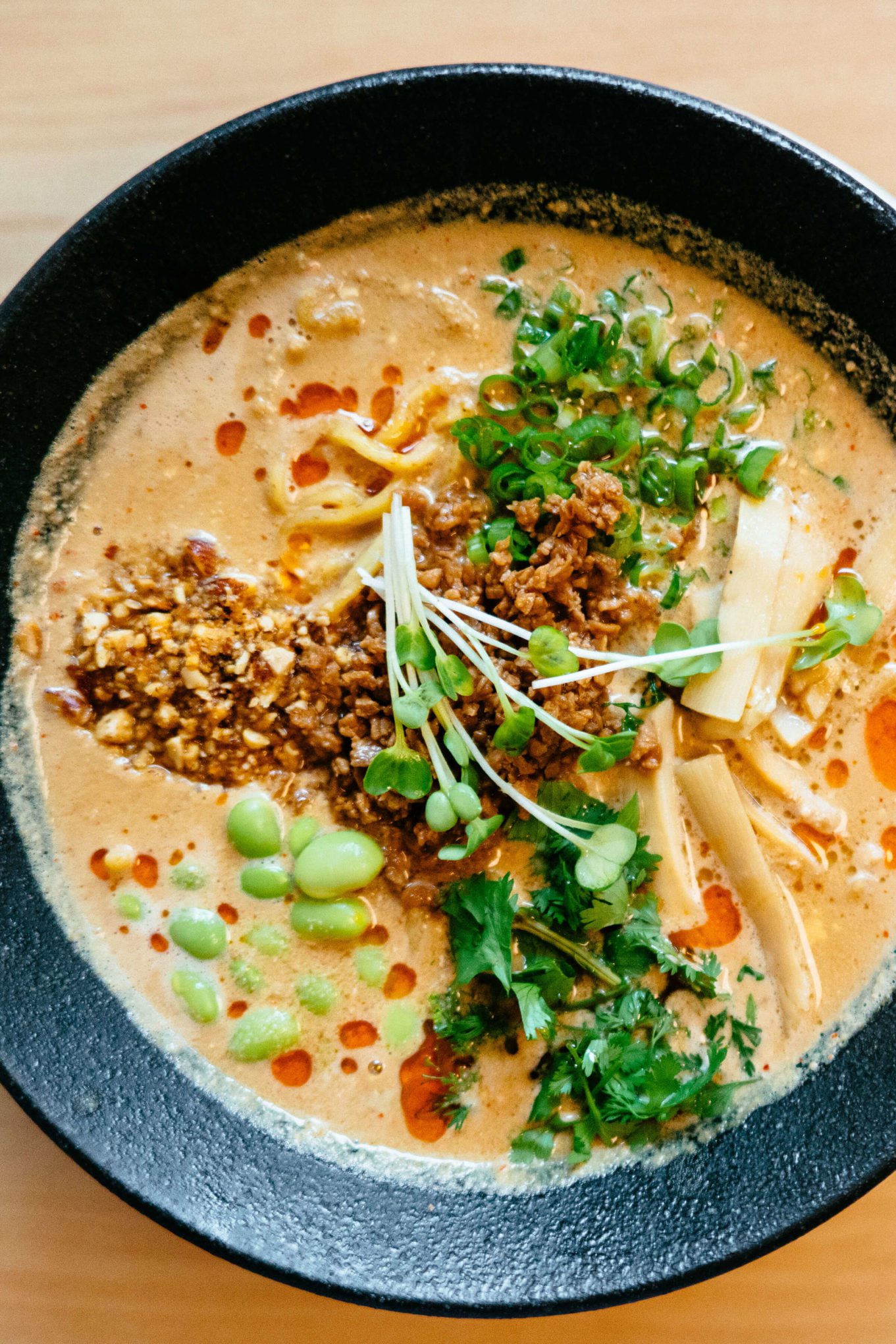 Mensho Tokyo SF ramen Vegan Tantanmen (vegetable soup with knob and mushrooms, premium Japanese soy cream, seven types of nuts, sesame, cilantro, chili oil, green onion, men, kale sprouts)