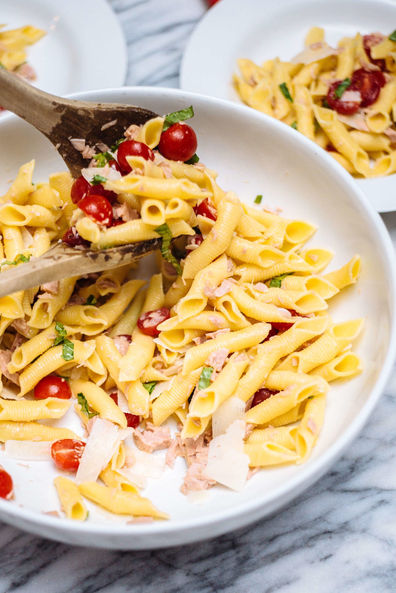 Serve your pasta with tuna and cherry tomatoes with cheese