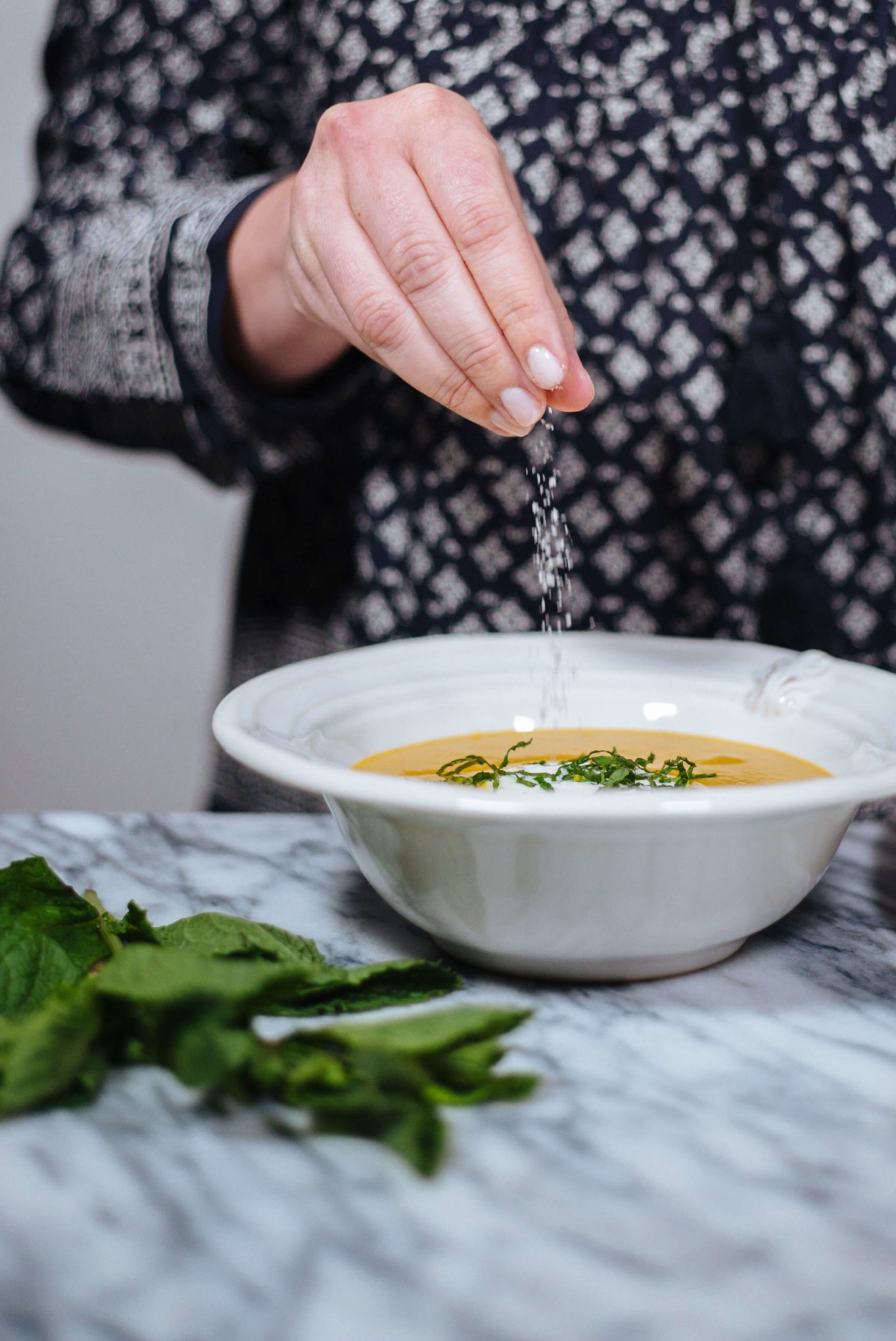 Top this spicy summer squash soup with salt and pepper