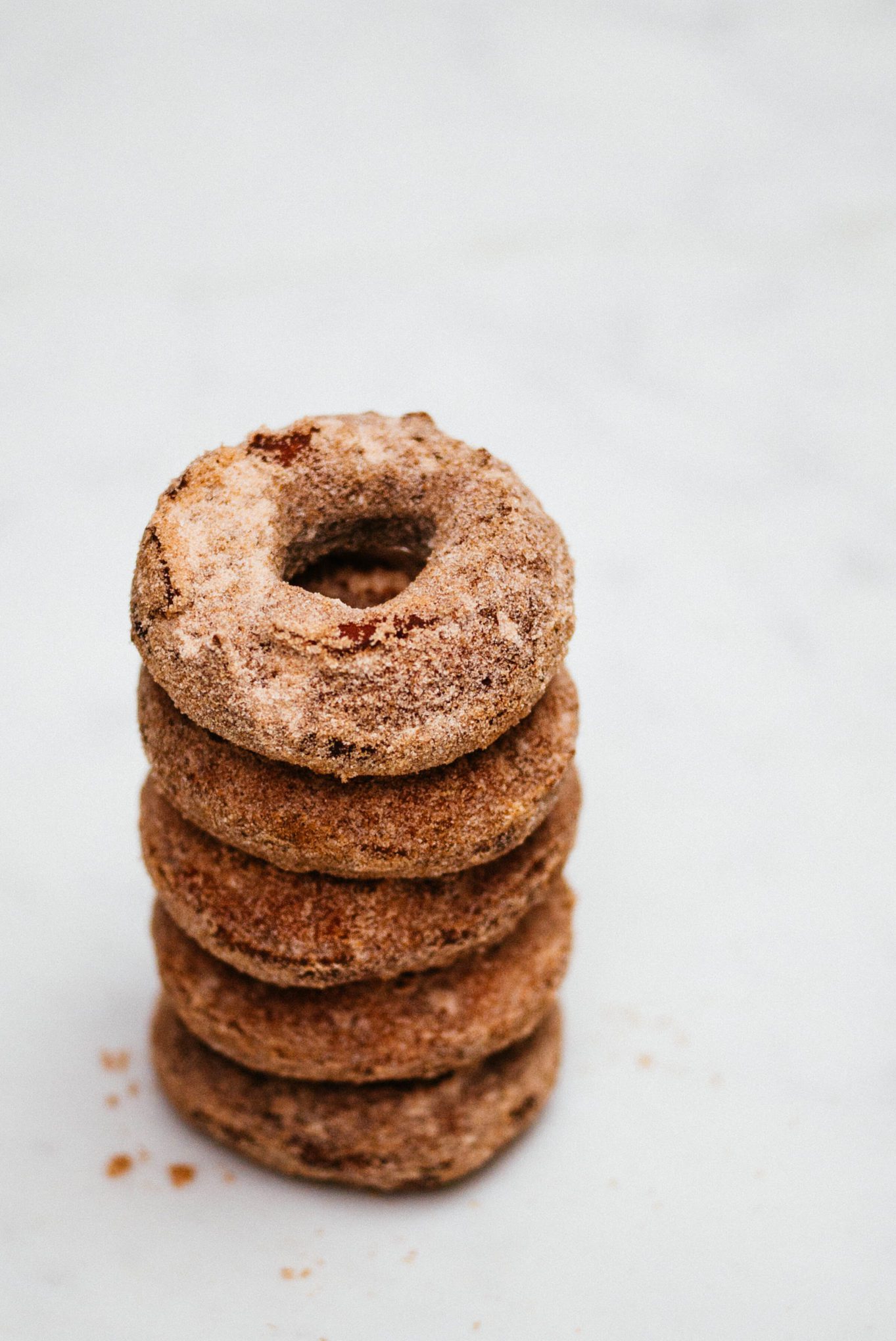Stack of the best Apple Cider Doughnut recipe by The Taste Edit
