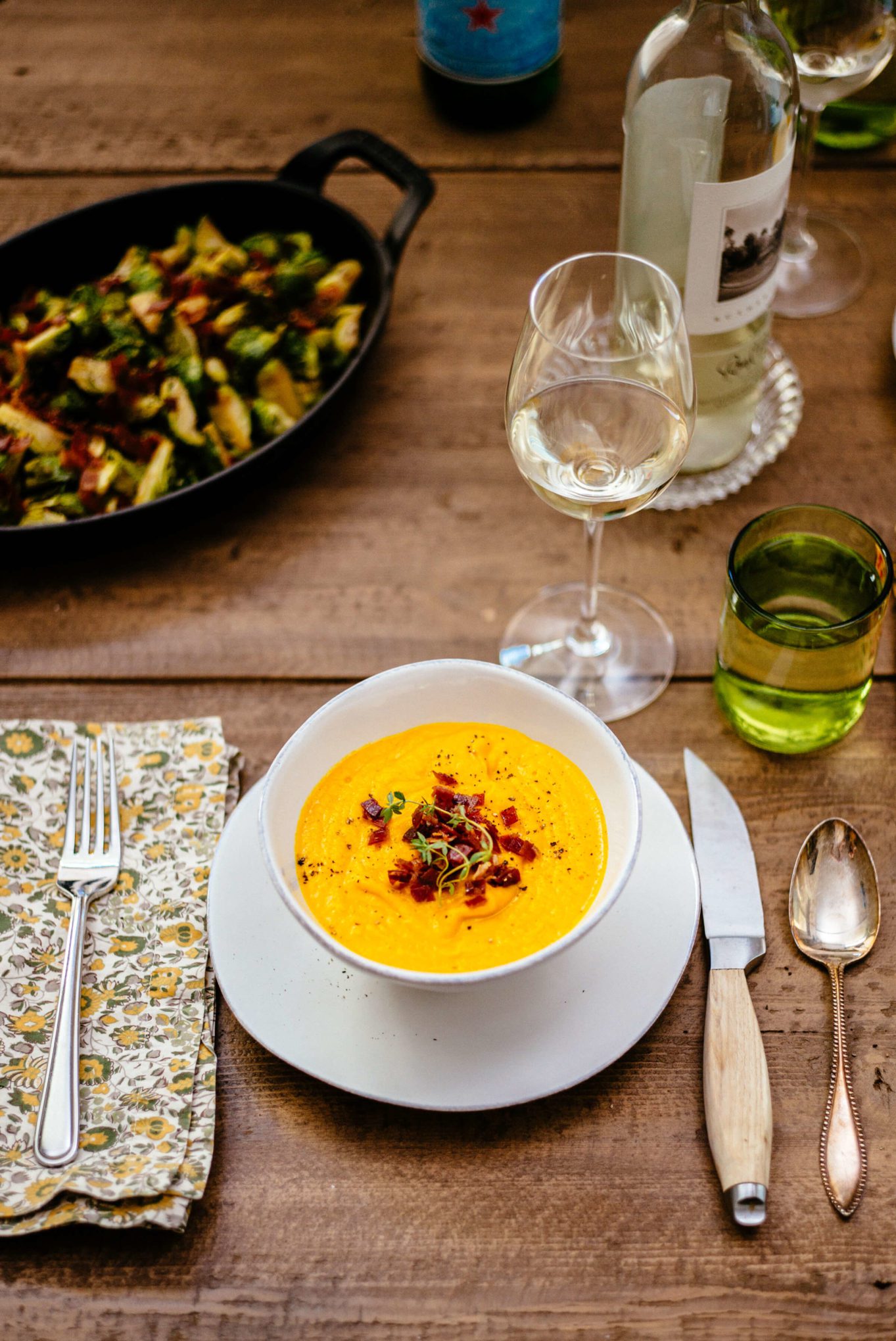 The Taste Edit serves Roasted Kabocha Squash Soup with Crispy Prosciutto paired with round pond sauvignon blanc at thanksgiving and spic roasted brussels sprouts 