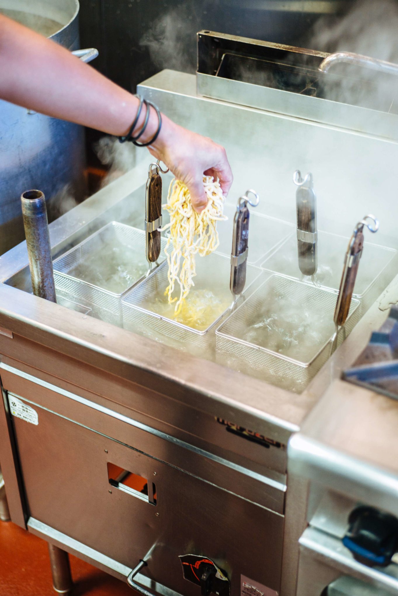 behind the scenes at mensho tokyo sf Chef Shono adds fresh ramen to boiling water