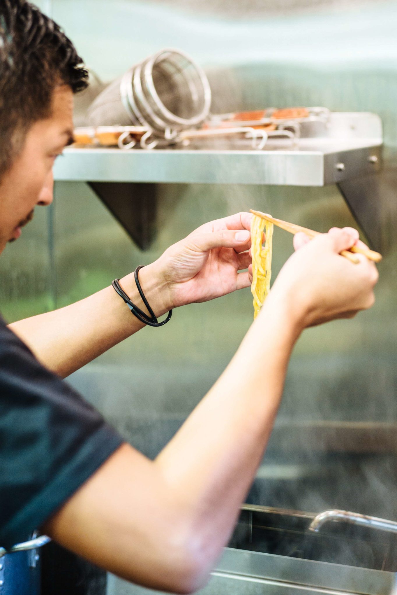 behind the scenes at mensho tokyo sf behind the scenes at mensho tokyo sf chef Tomoharu Shono checks the ramen