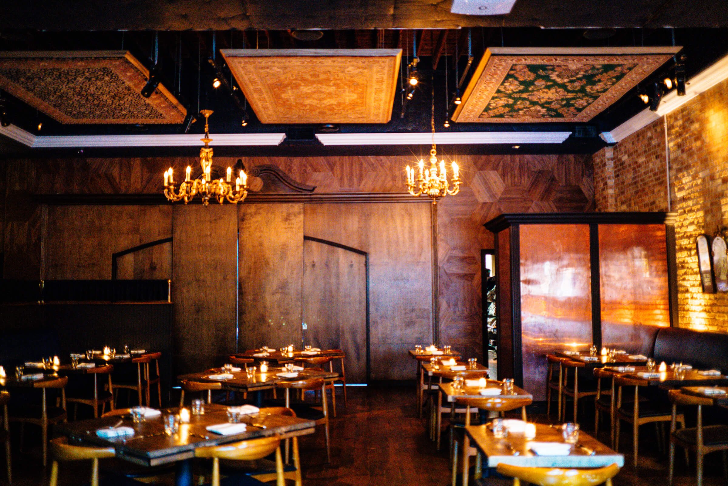 The Taste Edit visits Kimont in Chicago where they hang oriental rugs form the ceiling and have a field and stream rustic elegant vibe