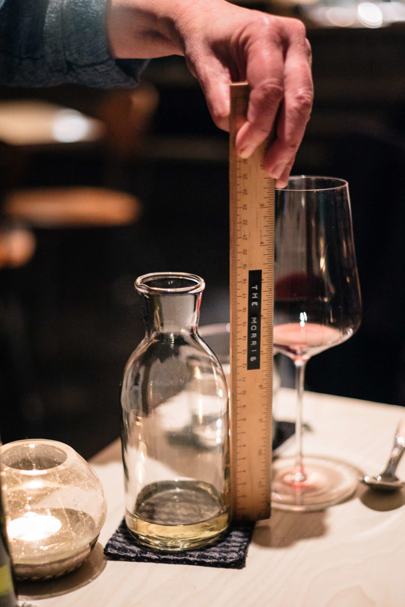 measuring the house wine at The Morris restaurant in San Francisco - The Taste Edit