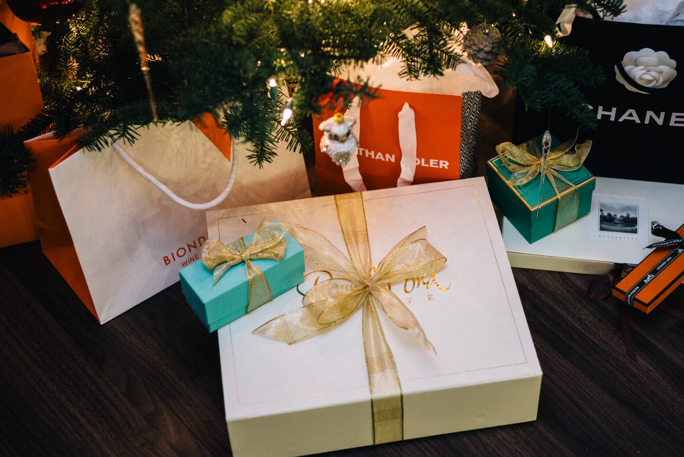 Round pond Christmas gifts under the christmas tree at The Taste Edit