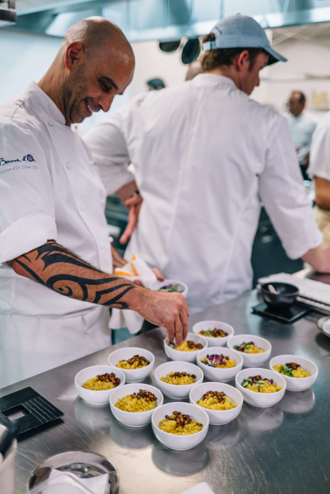 Chef Mourad Lahlou of Mourad plating couscous at Ment'or BKB's send off celebration for Team USA 2017 to the Bocuse D'or with The Taste Edit