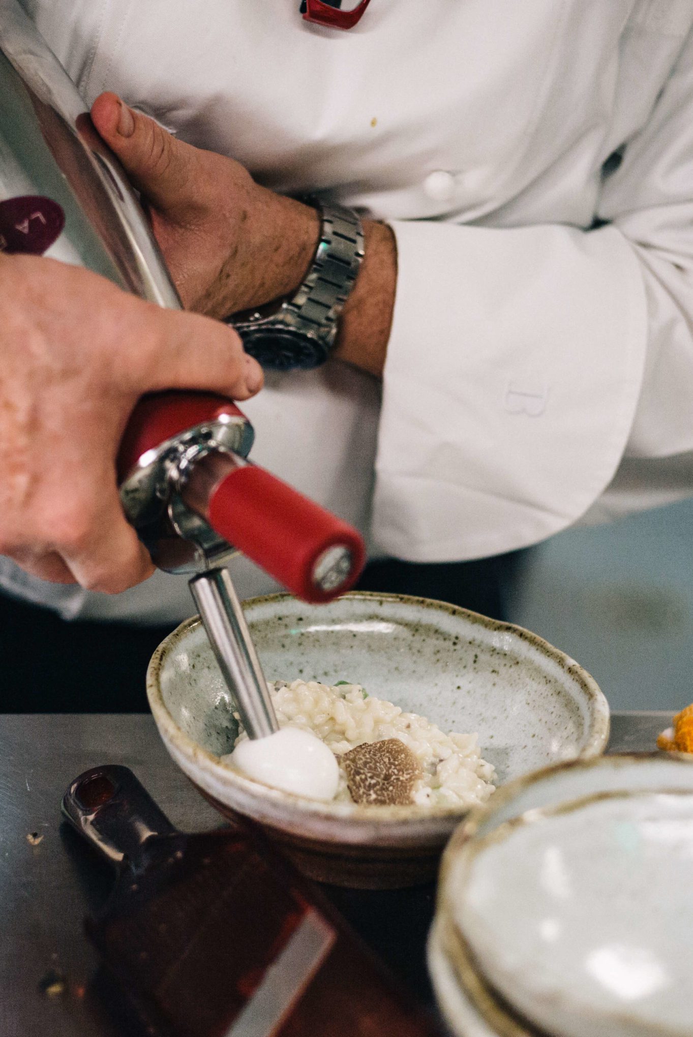 Roland Pastor of La Foile making wild mushroom risotto with black truffles at Ment'or BKB's send off celebration for Team USA 2017 to the Bocuse D'or with The Taste Edit