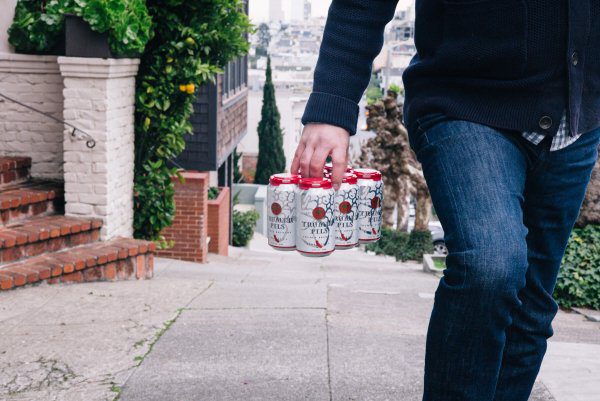 The Taste Edit carrying Trumer Pils Cans in San Francisco