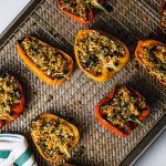 Baking these easy Italian stuffed peppers for a simple weeknight meal made with olives and anchovies by The Taste Edit