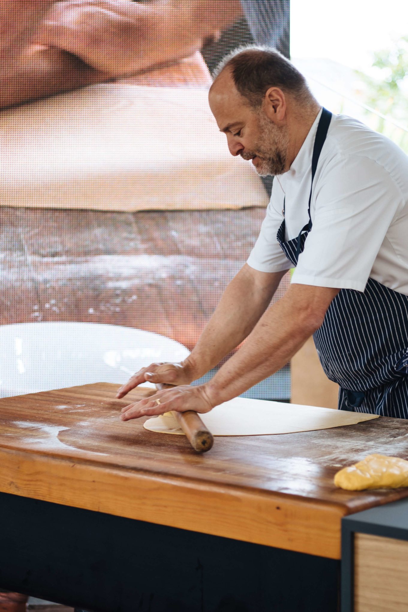 Michael Tusk of Quince and Cotogna rolling out pasta and demonstrates how to make handmade pasta at Relais and Chateaux GourmetFest in Carmel