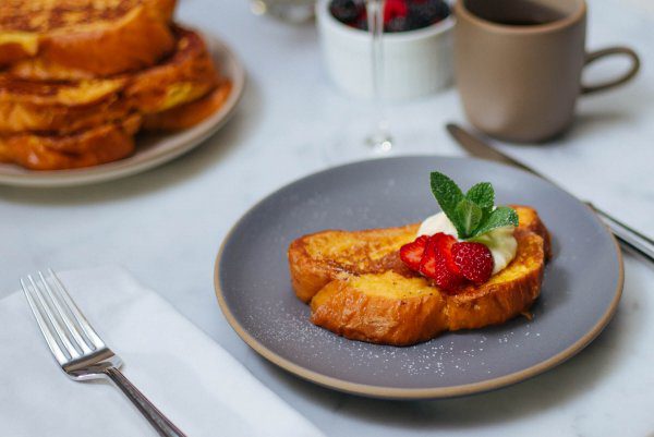 This simple Whipped Ricotta French Toast recipe is made with Grand Marnier by The Taste Edit is perfect for brunch with strawberries