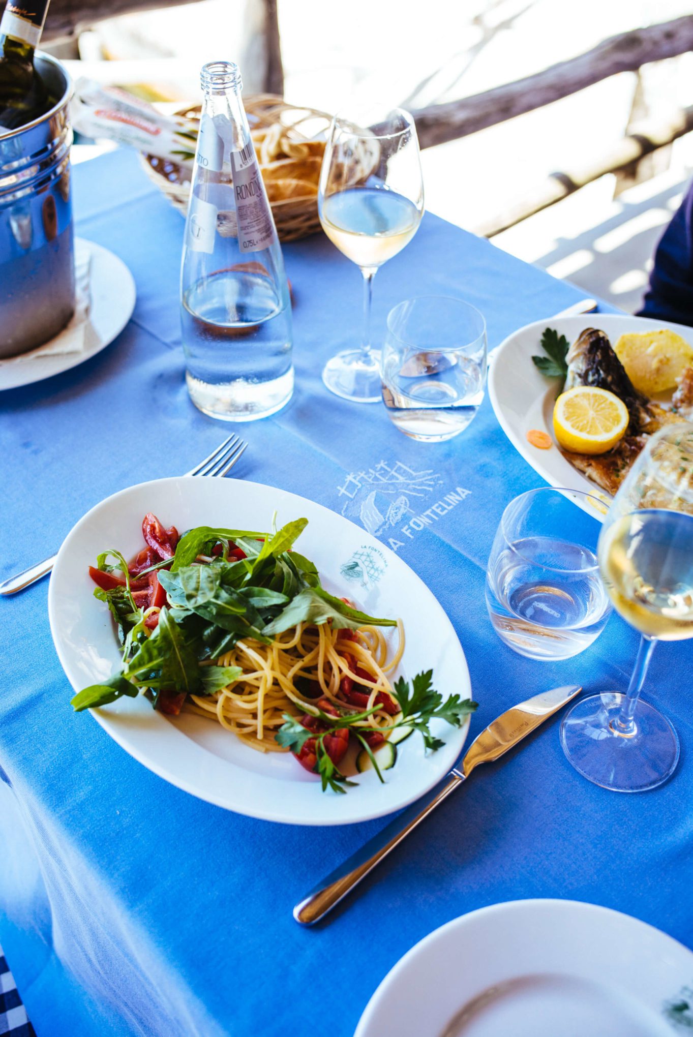 Take a boat to eat lunch on the water at Ristorante La Fontelina in Capri, Italy, The Taste Edit