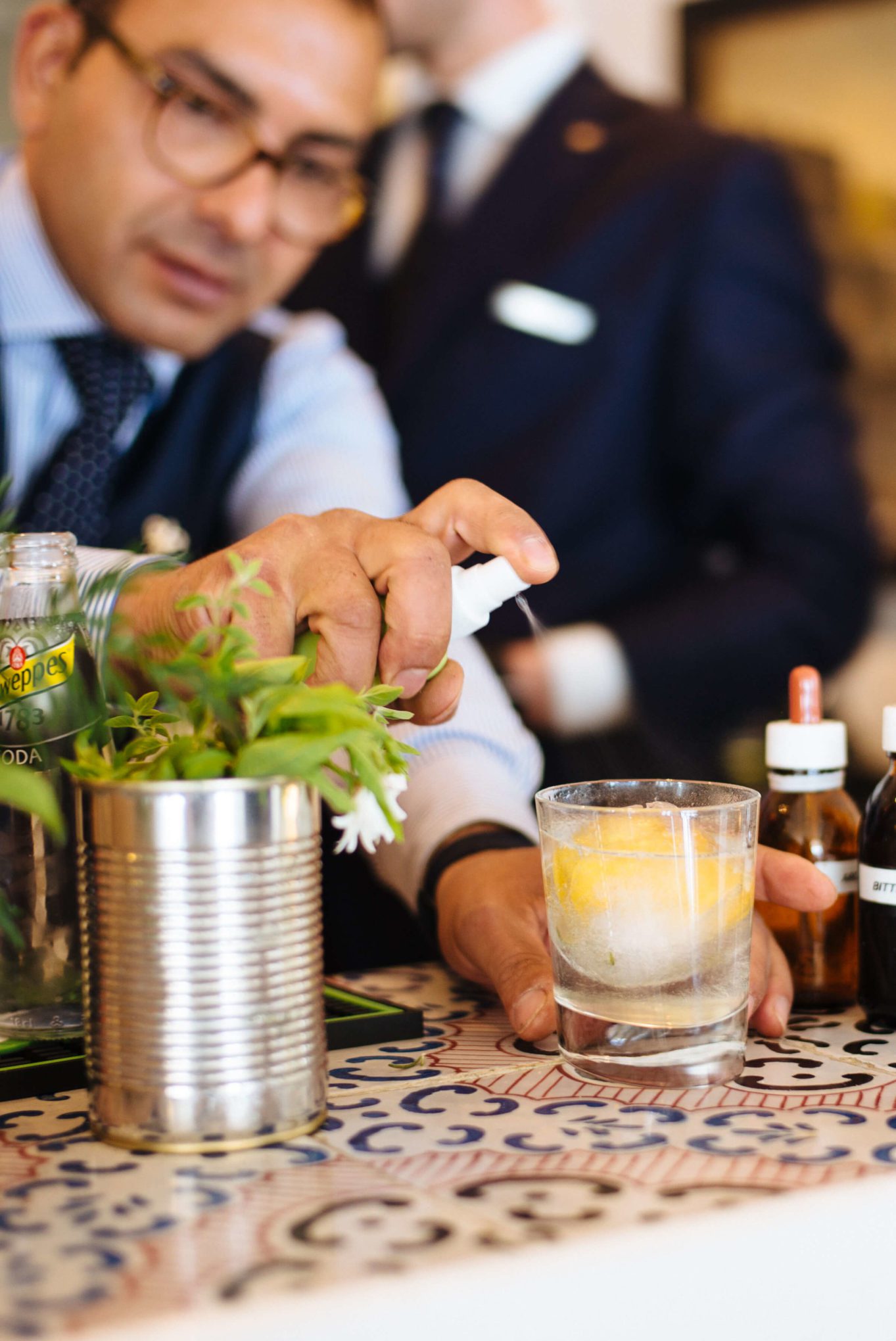 Spraying the cocktail made with a rose from the garden at Hotel Caesar Augustus in Capri, The Taste Edit #capri #travel #italy #cocktail #drink
