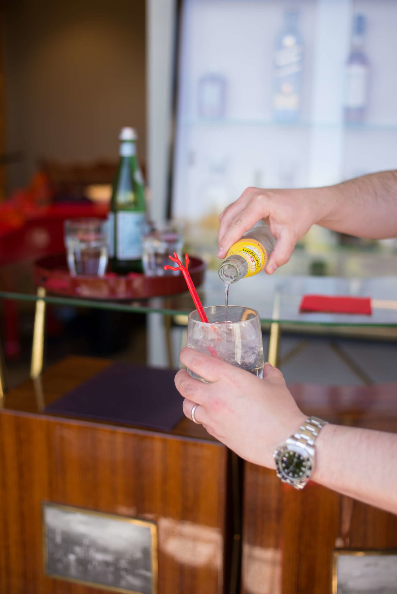 Cocktails while shopping at Isaia boutique in Capri, The Taste Edit