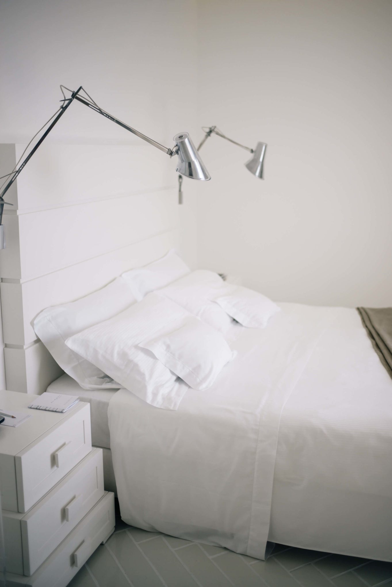 Bed and floss lamps at Casa Angelina Lifestyle Hotel in Praiano Italy, The Taste Edit