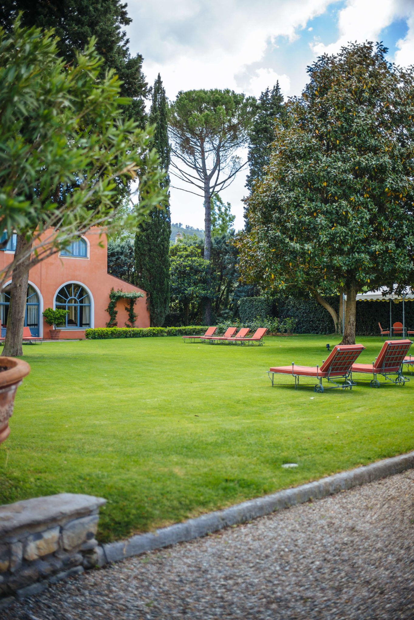 Lounging on the pristine lawn at Villa La Massa in Florence, italy, The Taste Edit