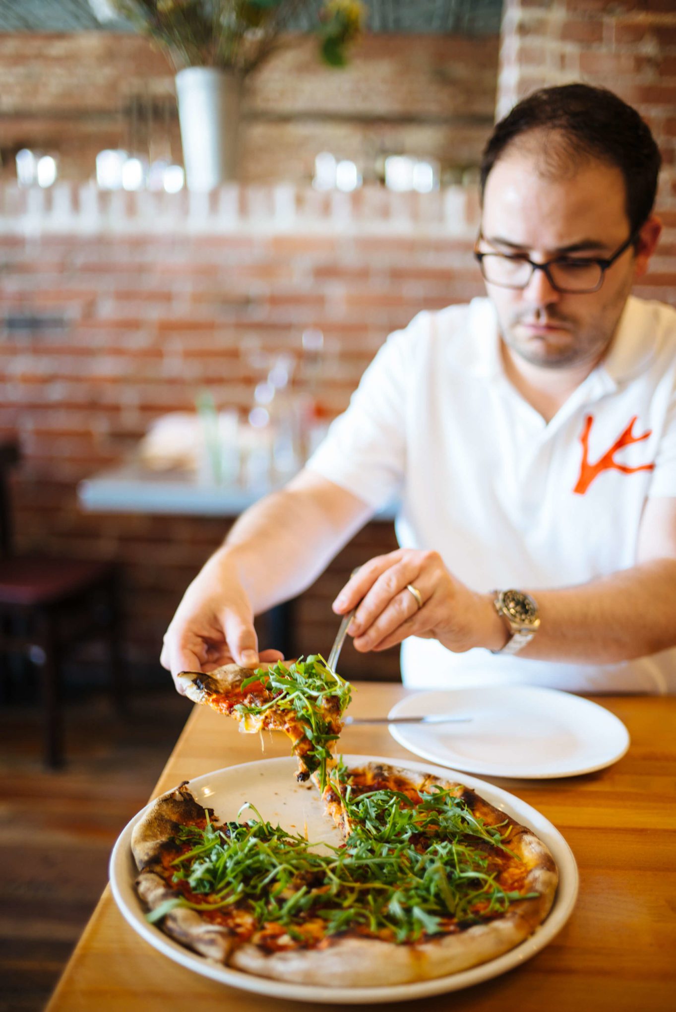 Pizza Diavola with Roasted Red Peppers, Provolone, Arugula, & Spicy Meatballs w/ Pine Nuts & Raisins at Diavola Pizzaria in geyserville, sonoma county, The Taste Edit