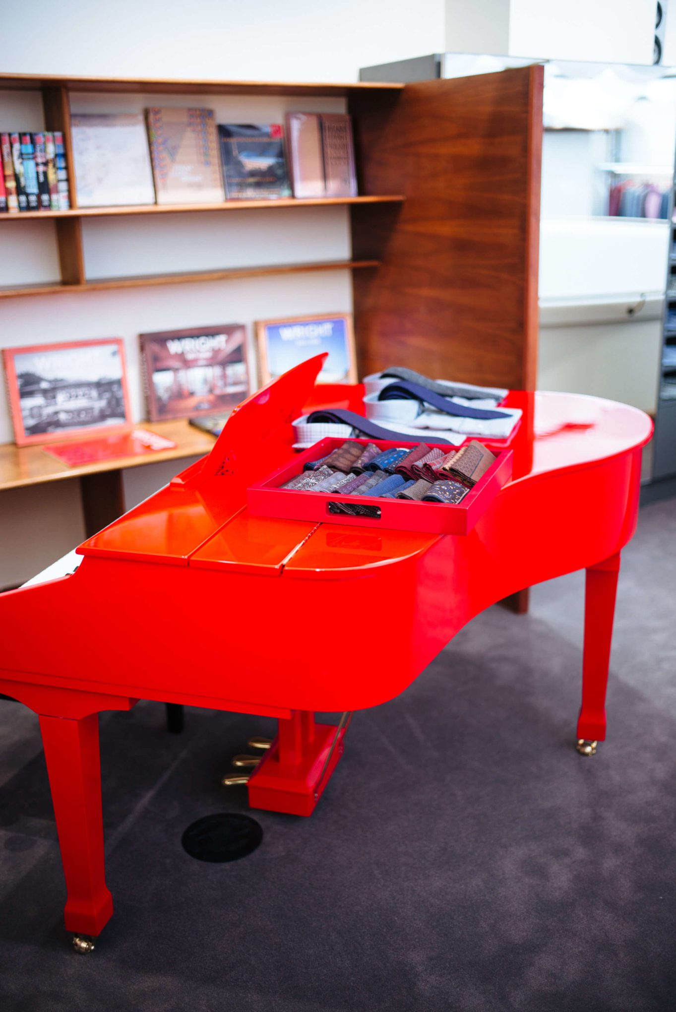 Red piano at Isaia San Francisco Store, Neapolitan Isaia suits in the historic VC Morris Frank Lloyd Wright San Francisco, The Taste Edit