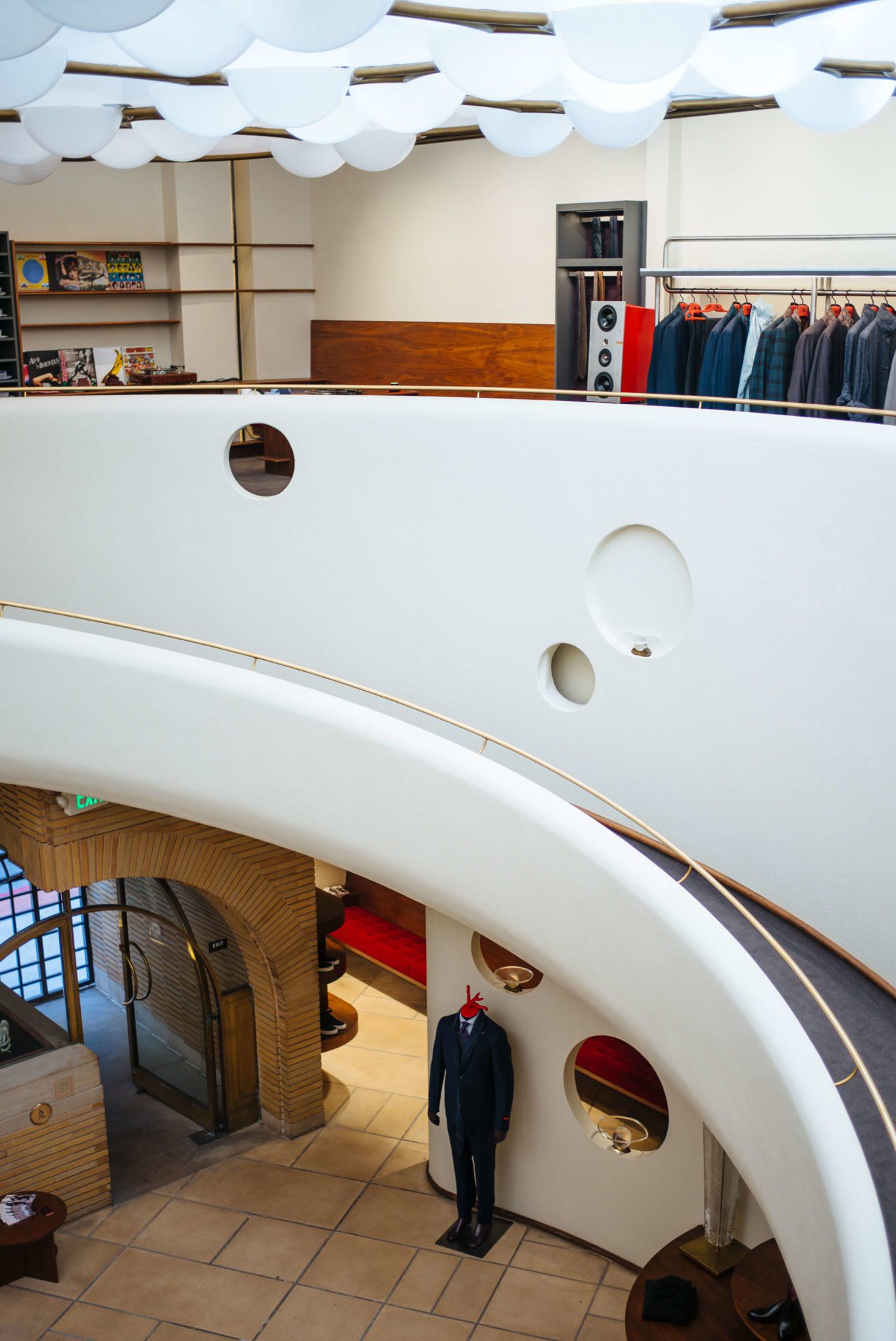 Historic staircase Isaia San Francisco Store, Neapolitan Isaia suits in the historic VC Morris Frank Lloyd Wright San Francisco, The Taste Edit