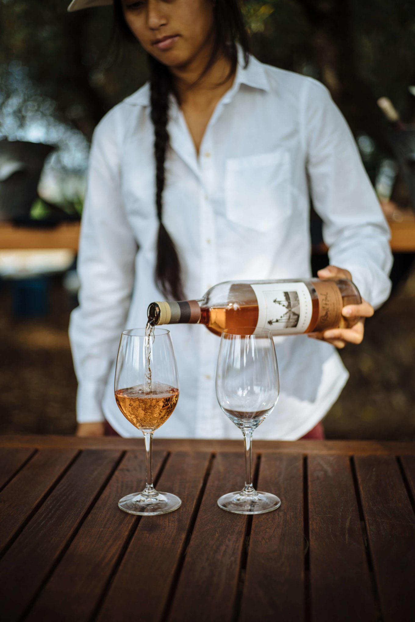 Pouring Round Pond Rose at Round Pond Estate Sunset Palm Dinner in Napa, The Taste Edit