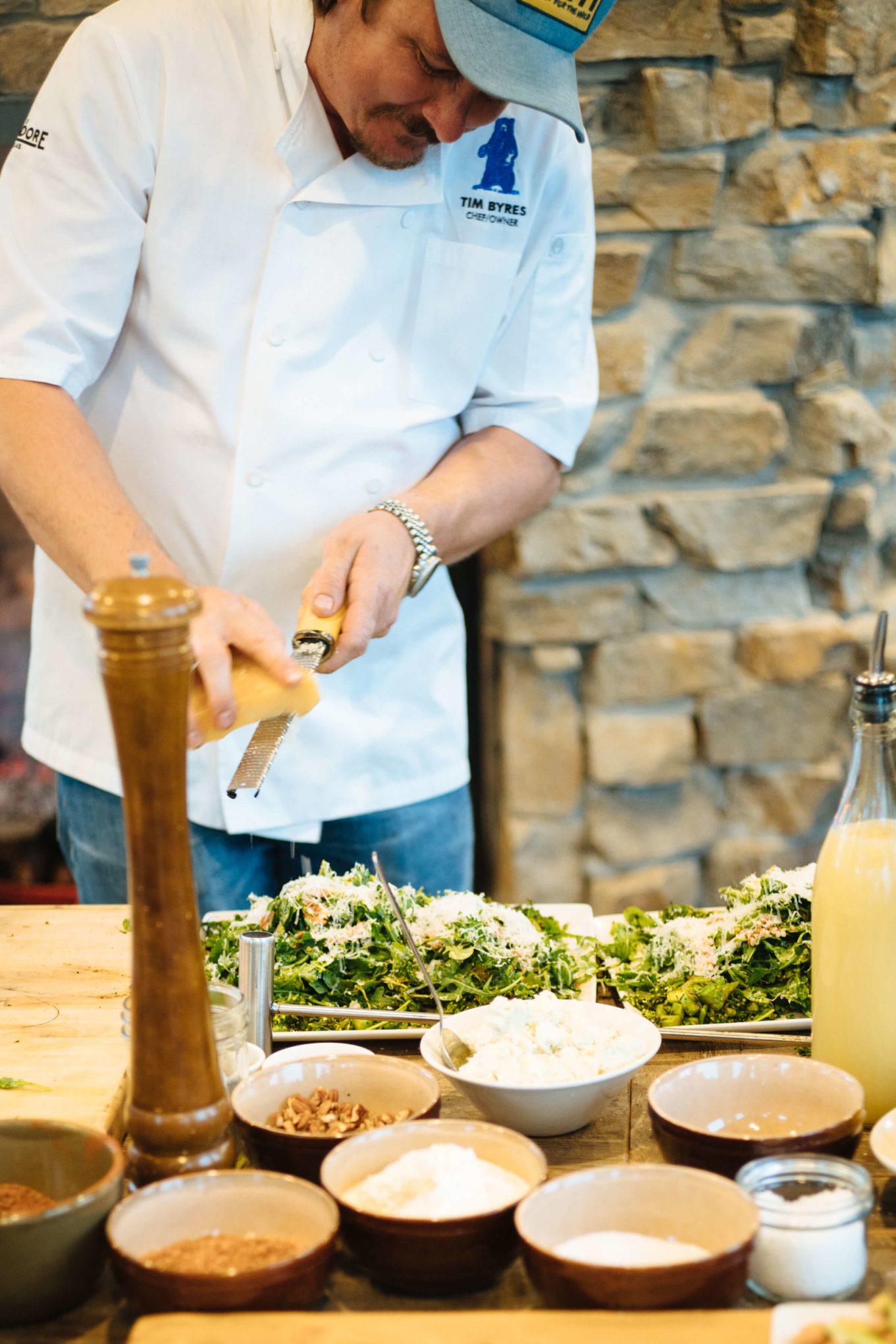 Make Tim Byres grilled broccoli rabe and arugula salad from his award winning smoke cookbook. The Taste Edit experiences it at their visit to Paws Up in Montana.