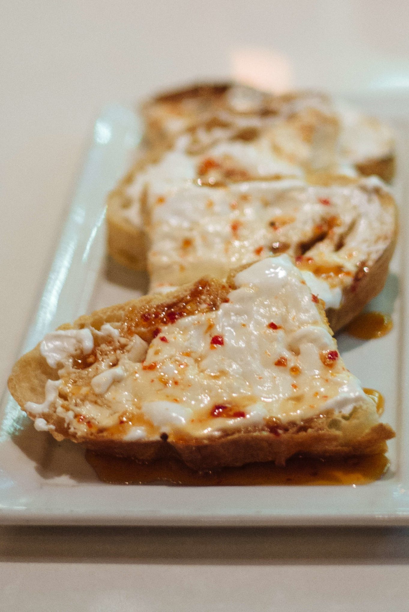 Ricotta appetizer with spicy honey drizzled over top at Reilly Craft Pizza in Tucson, The Taste Edit