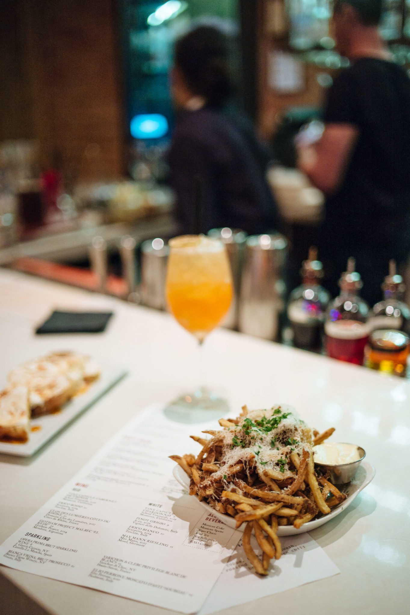 Garlic truffle fries and cocktails with goat cheese appetizer with honey at Reilly Craft Pizza in Tucson, The Taste Edit