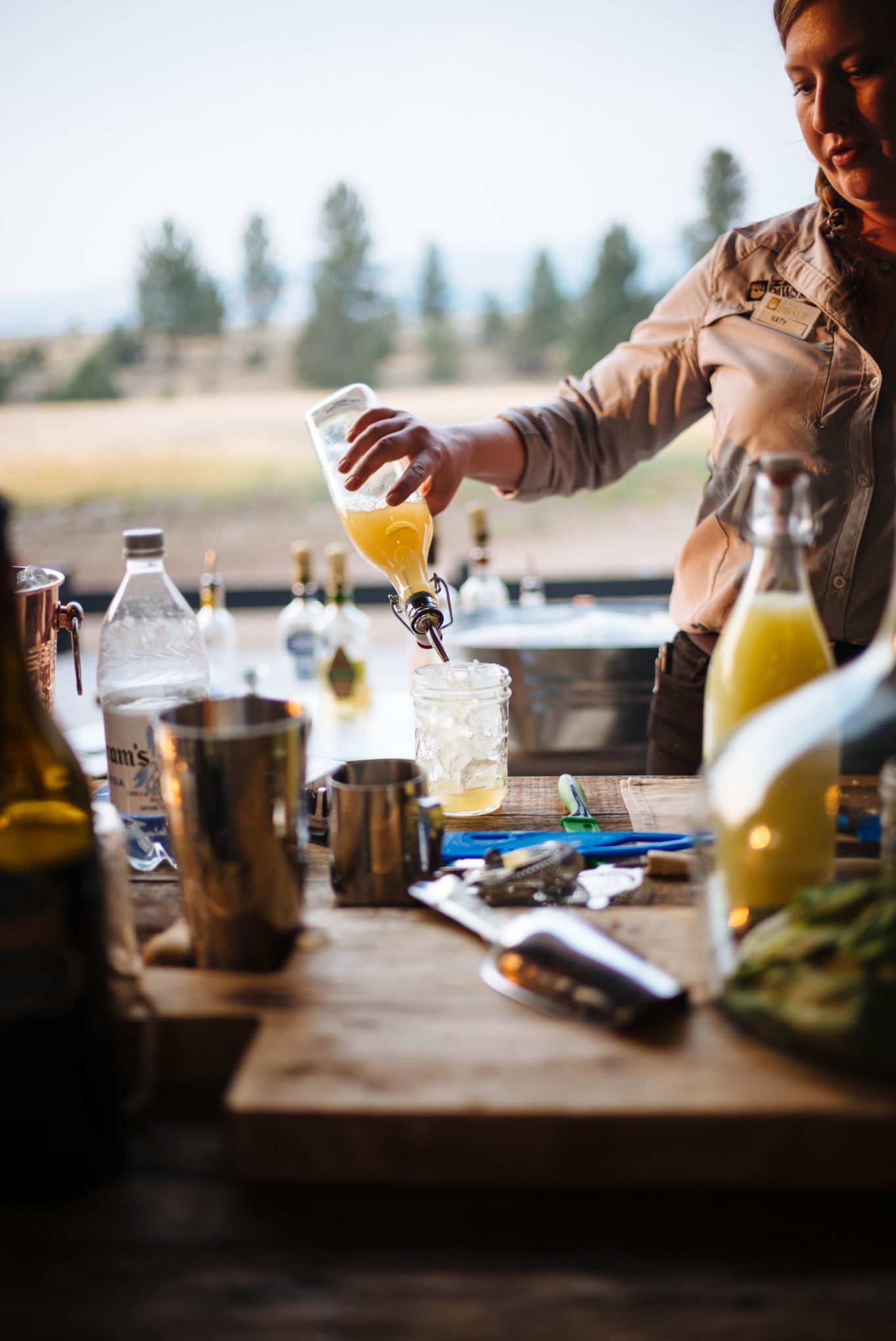 Make Tim Byres Woodshed Margarita made with tequila and cedar wood plank from his book Smoke. Photo by The Taste Edit from Paws Up in Montana.