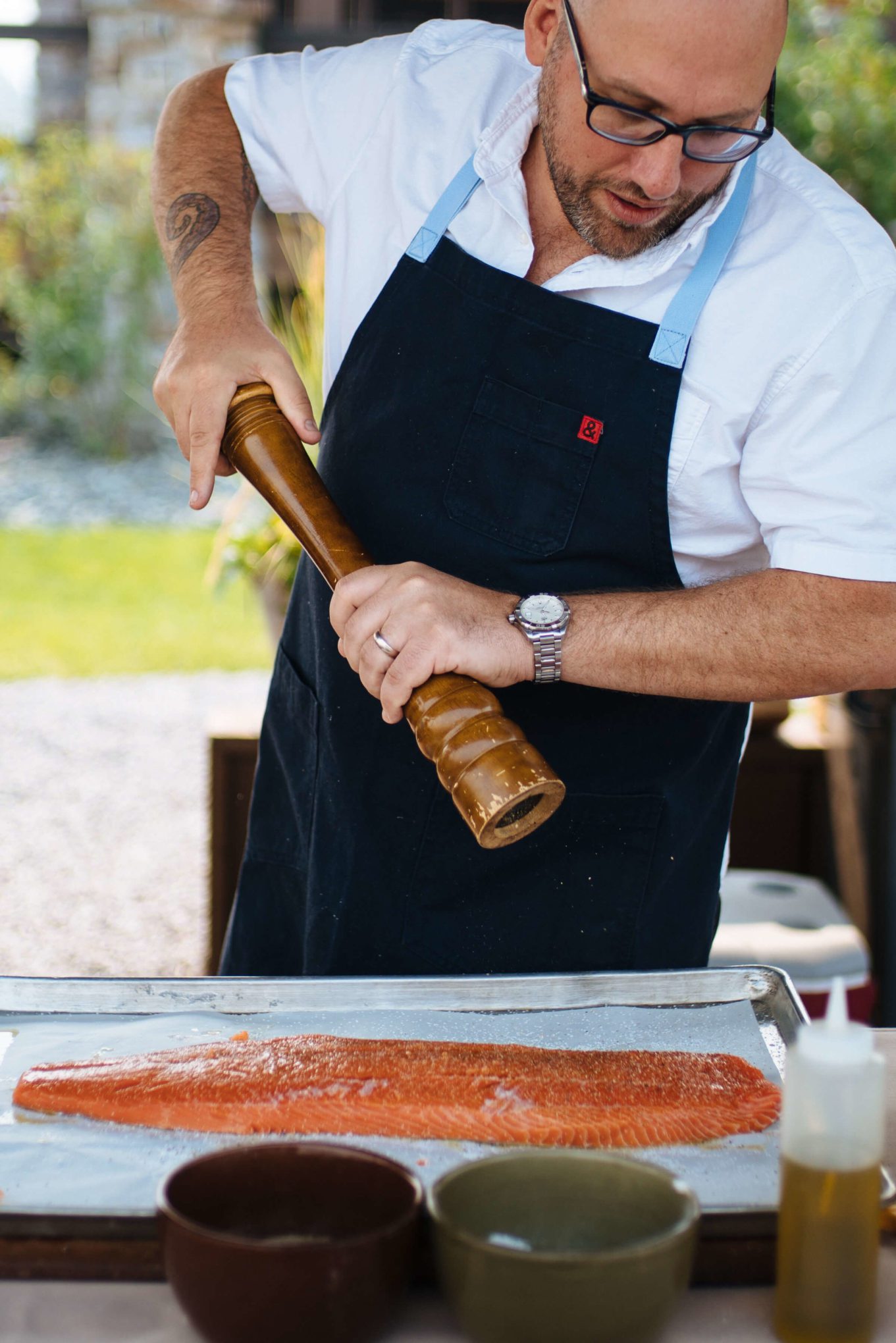 Chef's Grilled salmon recipe from the Dentons in Ox Portland, season salmon by salt and peppering the salmon, the resort at paws up, montana glamping, cookbook live, greg denton OX restaurant Portland, The Taste Edit